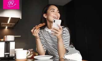 Image Happy Asian Woman Eating 600w 2001960107 1