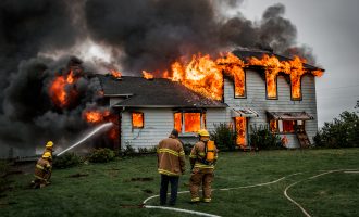 Fire,fighters,putting,out,a,house,fire