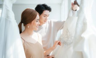 Couple,visit,wedding,studio,to,choose,their,wedding,costume,,a